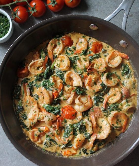 Shrimps, parmesan creamy sauce and spinach